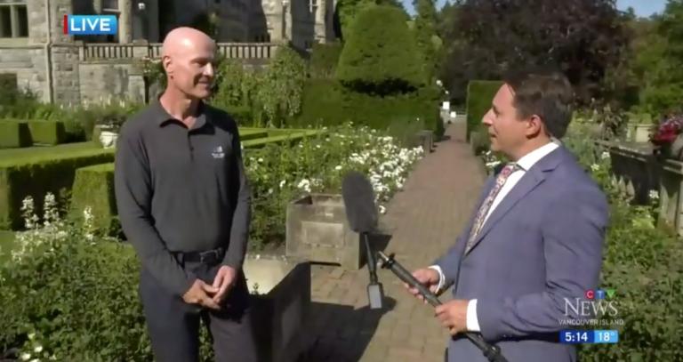 President Philip Steenkamp speaking into a microphone with a CTV News Network camera person