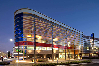 An image of BCIT's campus illuminated at night, linking to a page about the MA in Intercultural & International Communication program