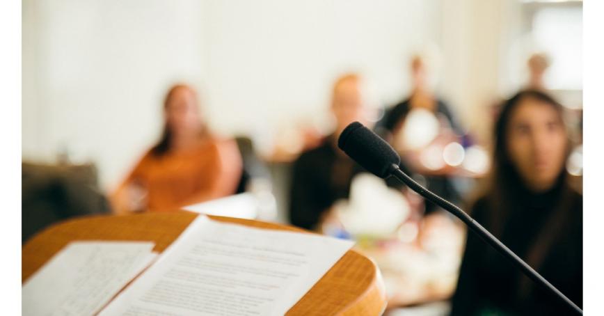 podium-with-notes-and-microphone