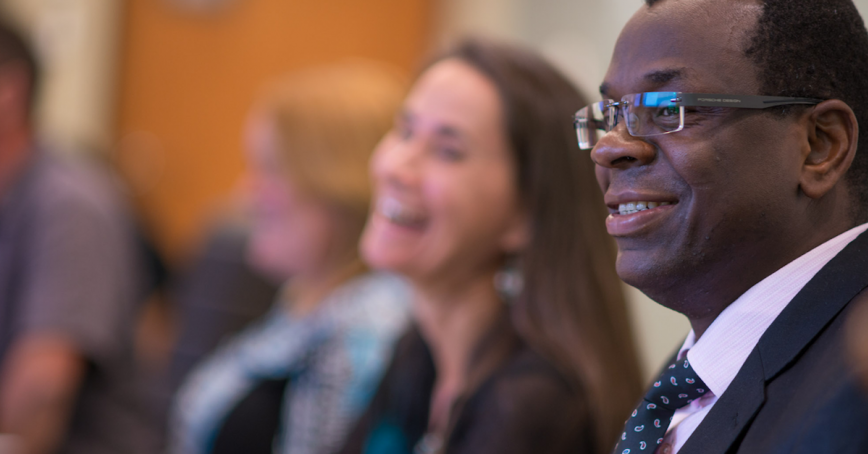 Audience members at a talk.