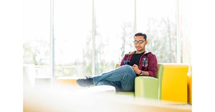 Student-mahbubul-alam-shoura-sitting-with-phone