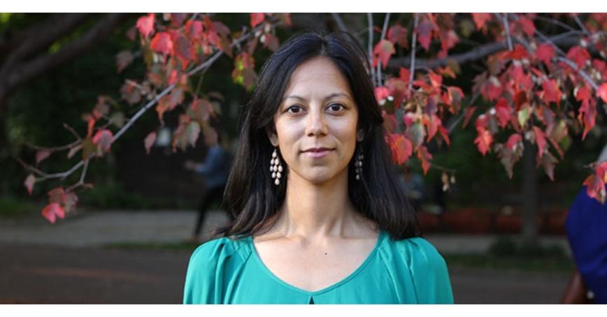 runa_das-in-front-of-tree-with-red-leaves