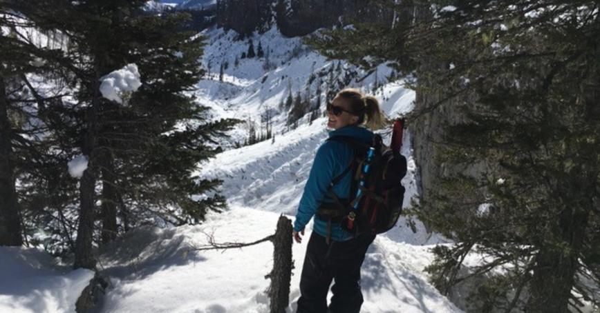 Woodruff standing atop a snow mountain