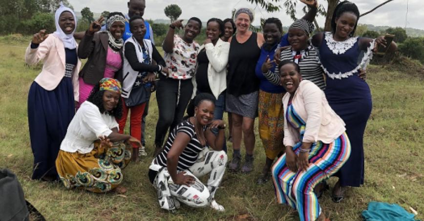 Group-of-Ugandan-women-with-researcher