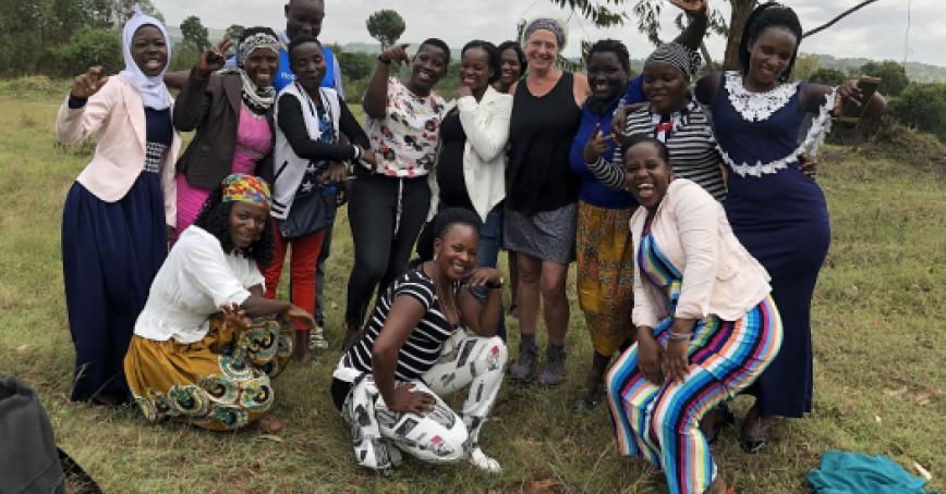 Group-of-Ugandan-women-with-researcher