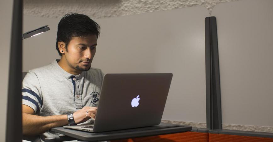 Student working on a laptop.