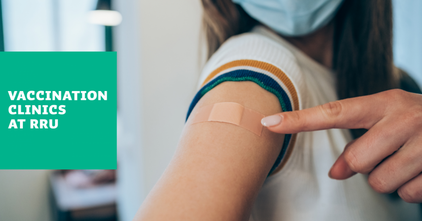 A student points to a post-vaccination bandage on her shoulder. The text reads: Vaccination Clinics at RRU.