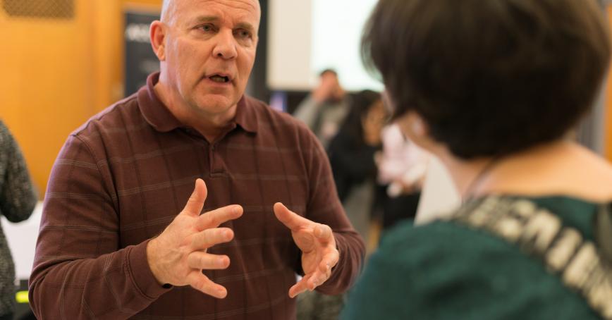 Two individuals having a conversation