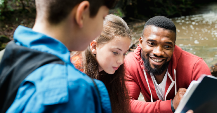 adult teaching children