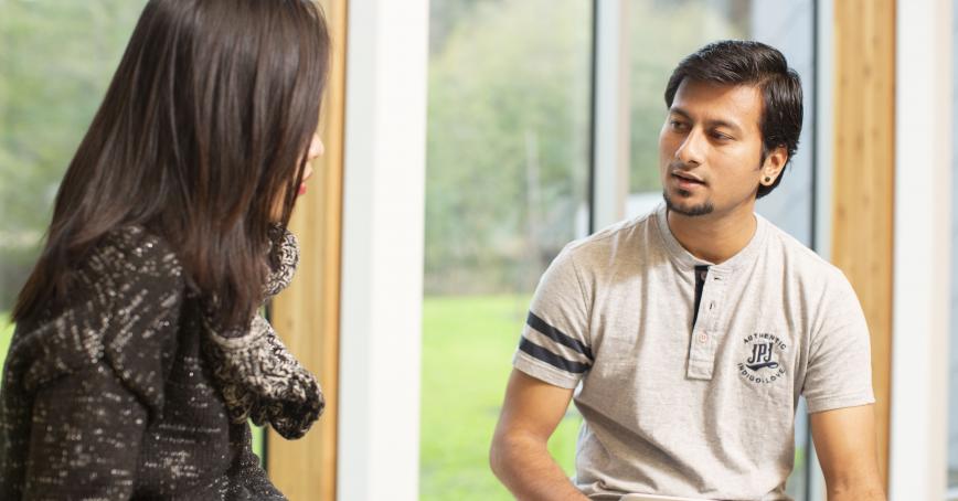 Two students having a conversation