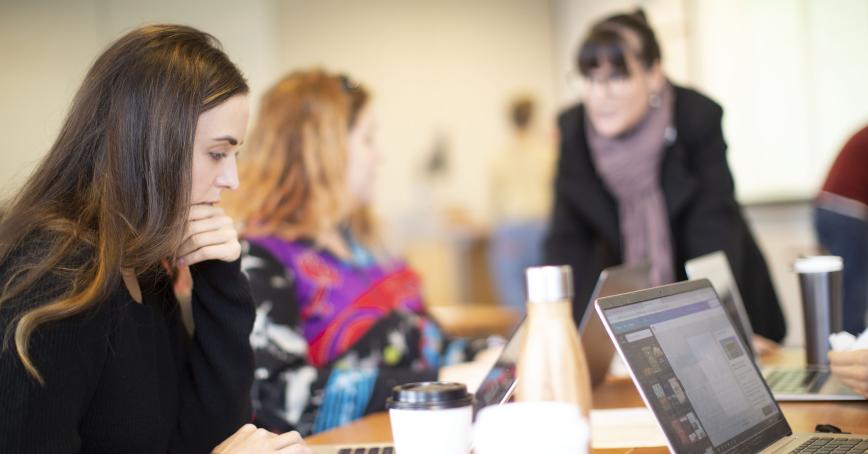 Student looking at laptop