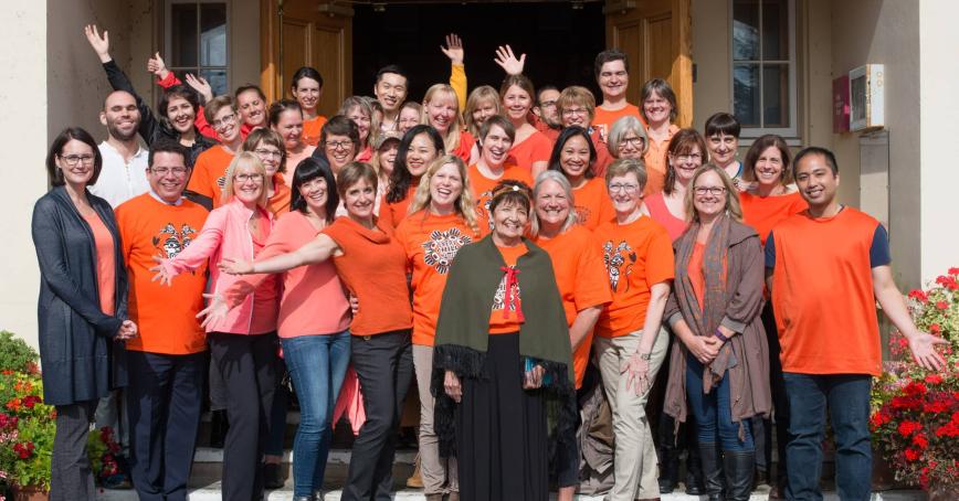 A group of RRU members wearing orange shirts for Orange Shirt Day.