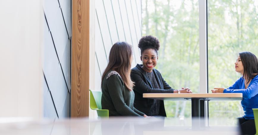 students talking on campus