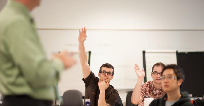 Students raising hands 