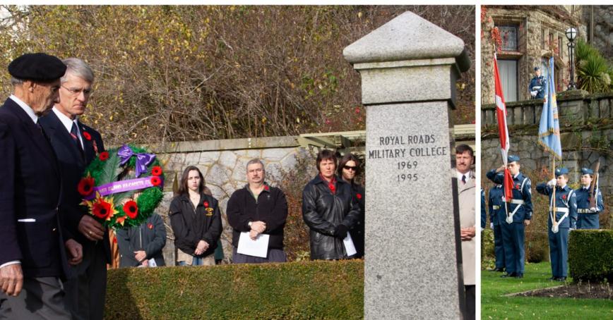 Two veterans carry a wreath toward a cenotaph during a Remembrance Day ceremony.