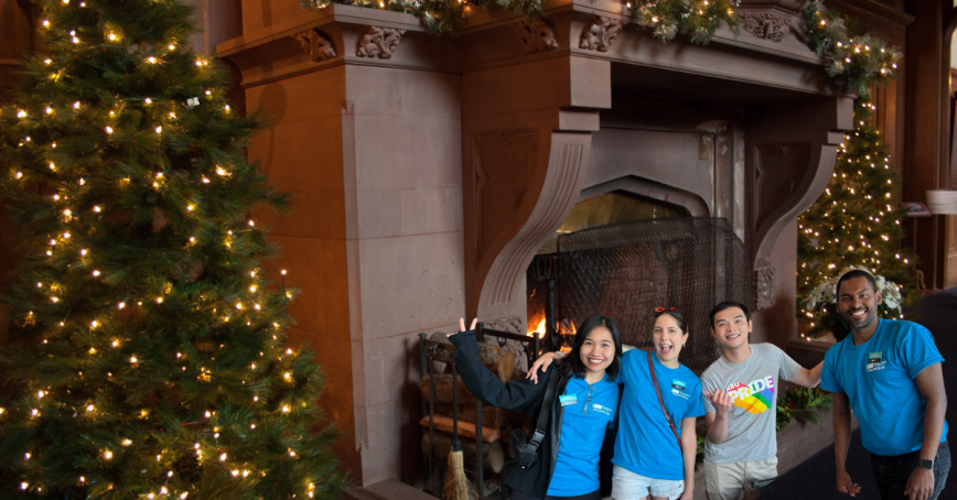 Indoors at Hatley Castle decorated for Christomas with campus ambassadors added in