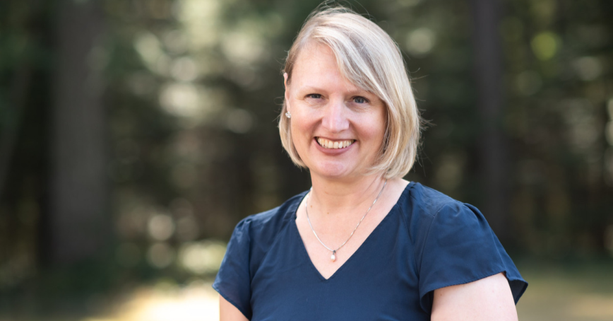 Headshot of a smiling Tracy Smith-Carrier.