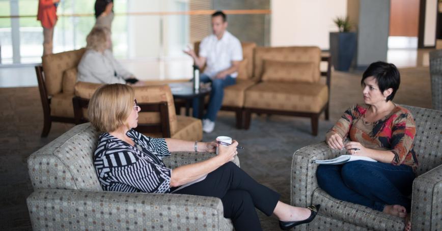 students talking after class