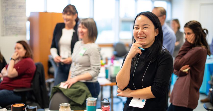 Students laughing in a classroom