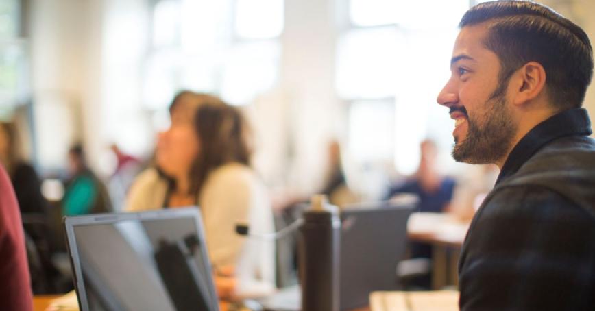 student smiling in class