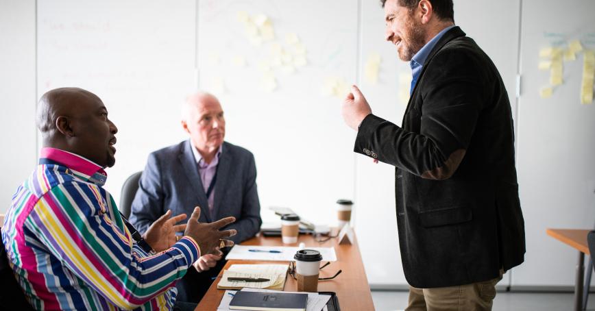 Professor talking to students