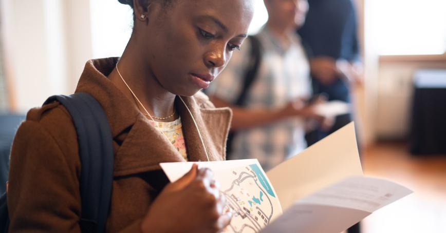 RRU student viewing campus map