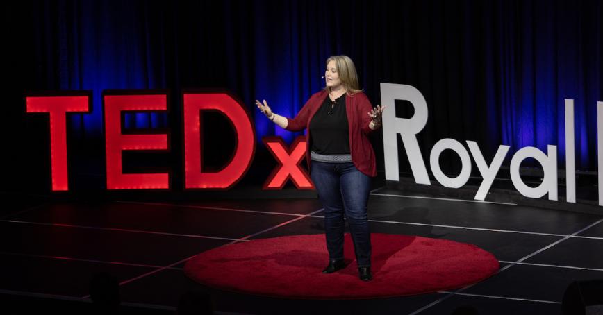 Candice Neveu talking on stage at TEDx Royal Roads.