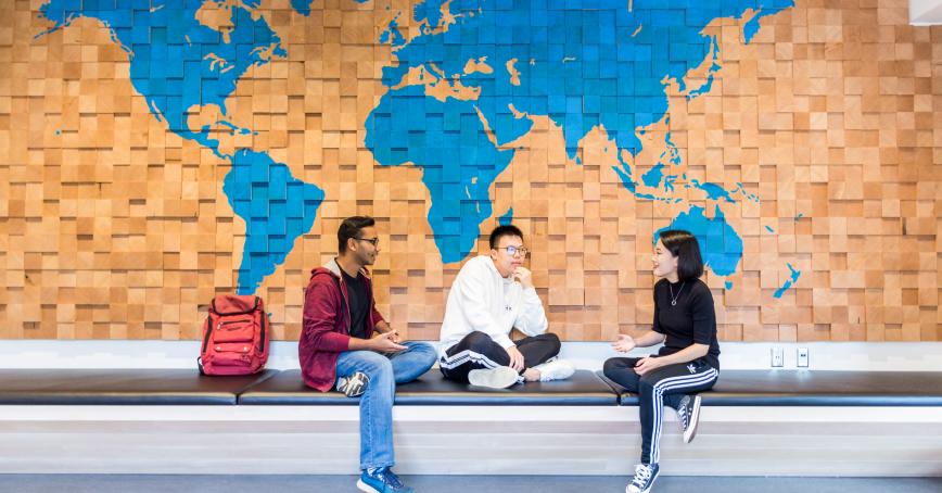 students infront of map