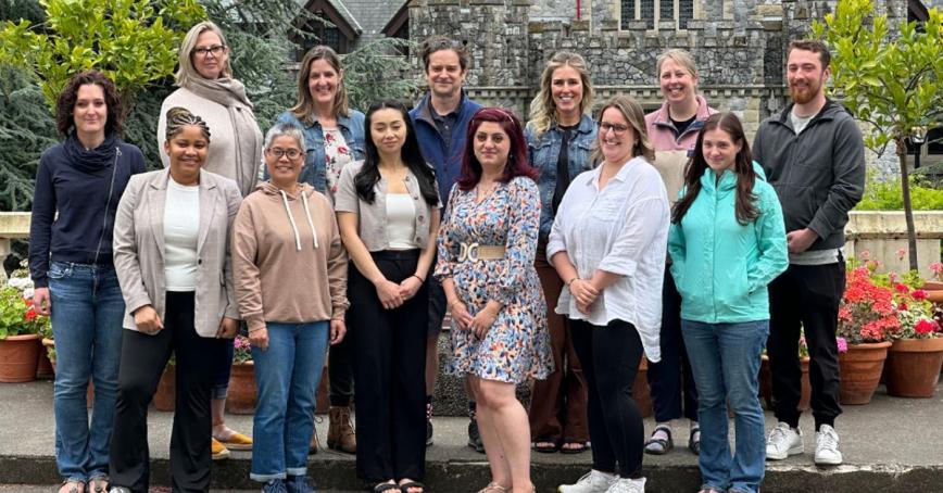 Master of Arts in Professional Communication students standing in front of Hatley Castle.