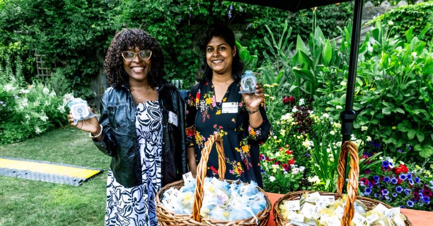 Janet Befo, Sarjina Hossain Trima stand next to each other in the Royal Roads gardens.