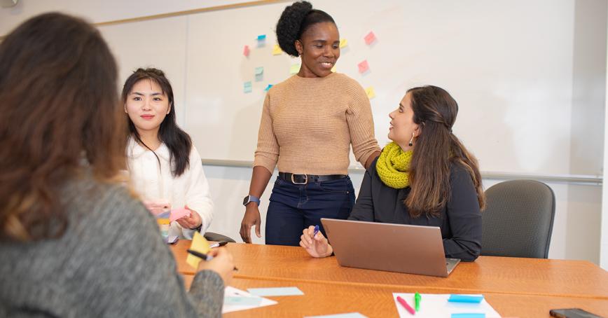 students looking at each other and laughing