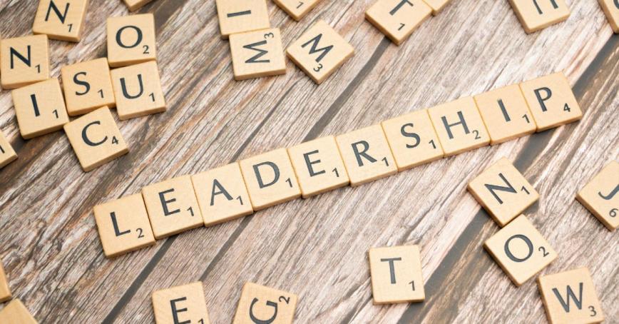 Wooden letter tiles spelling "leadership"