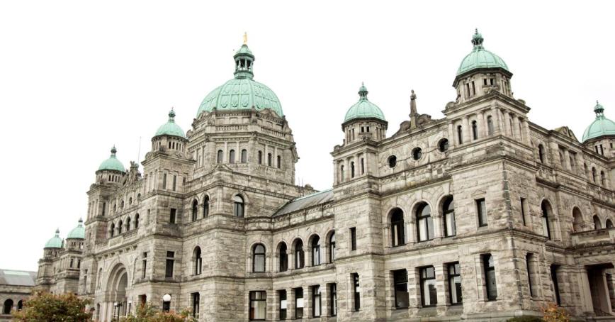 The BC Legislature on a cloudy day from a side angle