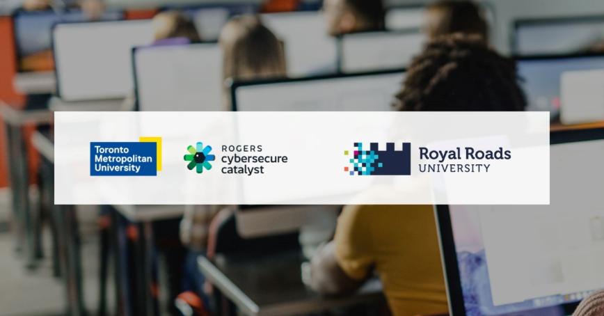 The logos of Toronto Metropolitan University, Rogers Cybersecure Catalyst and Royal Roads University against a white background, superimposed over an image of people using computers in a classroom