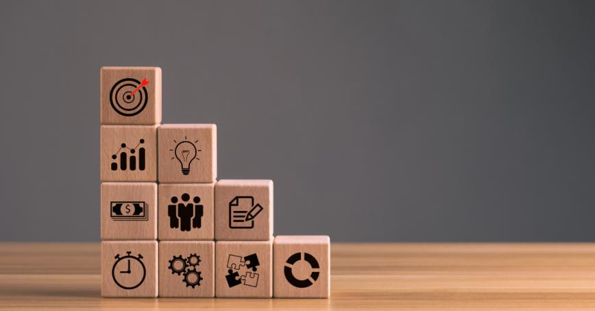 wood block stacking as step stair on table with icon Action plan, company strategy development, business goal, business strategy, organizational structure management