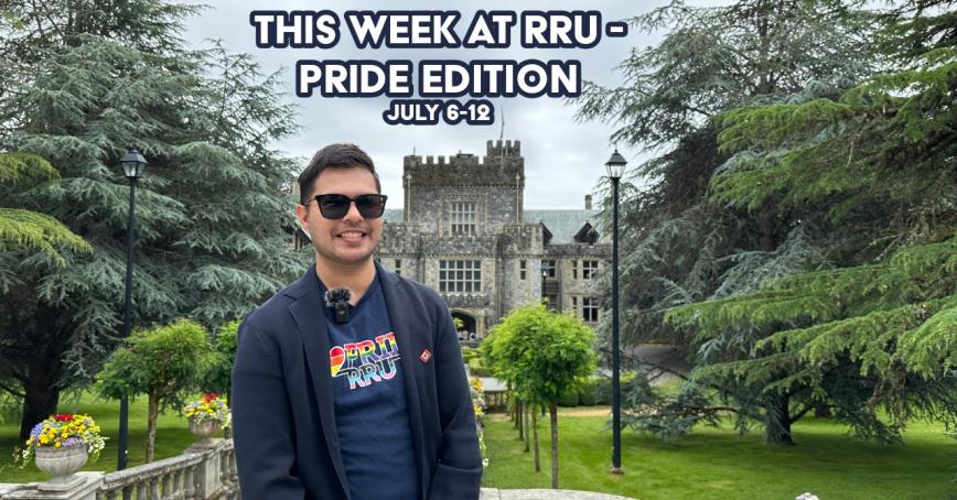 Man standing in front of Hatley Castle with a navy shirt saying 'RRU Pride'