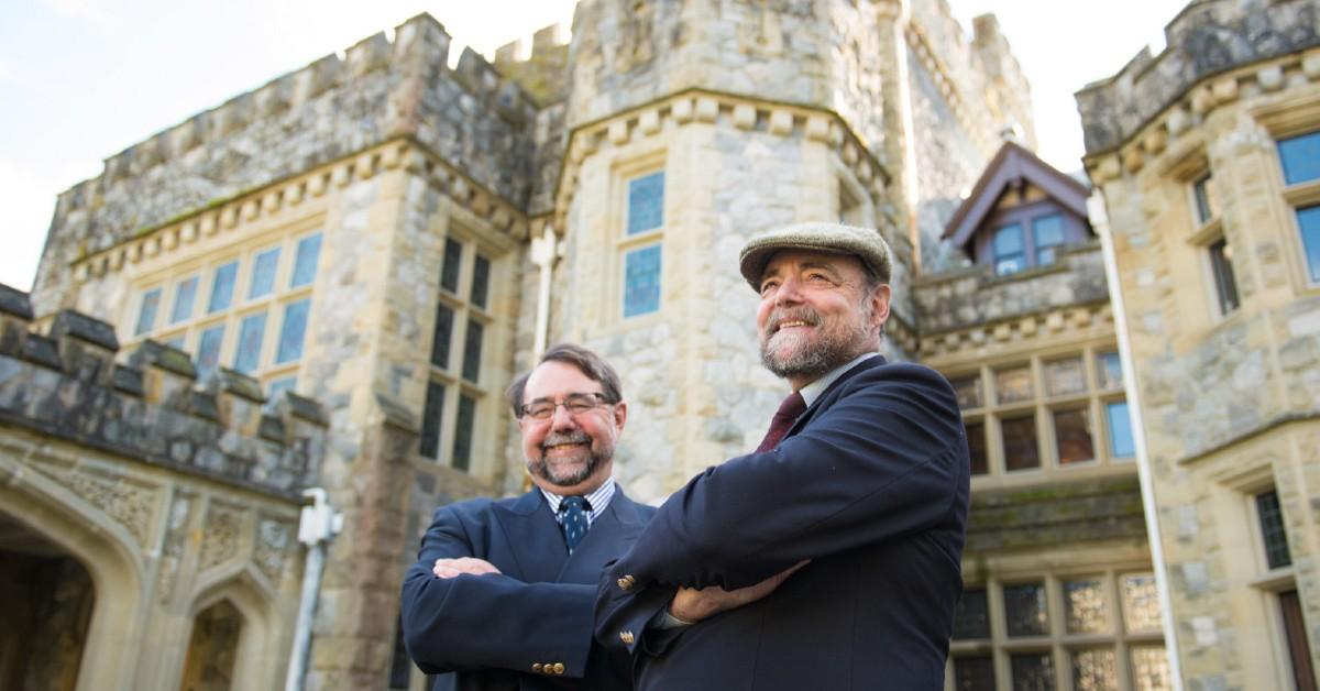 Charles brothers standing in front of Hatley Castle