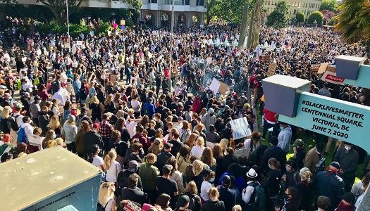 Crowd of people at a black lives matter event.