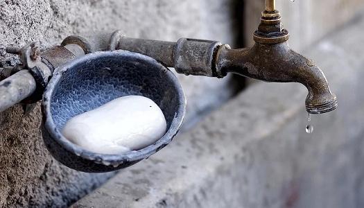 Outdoor-faucet-with-bar-of-soap-beside-it