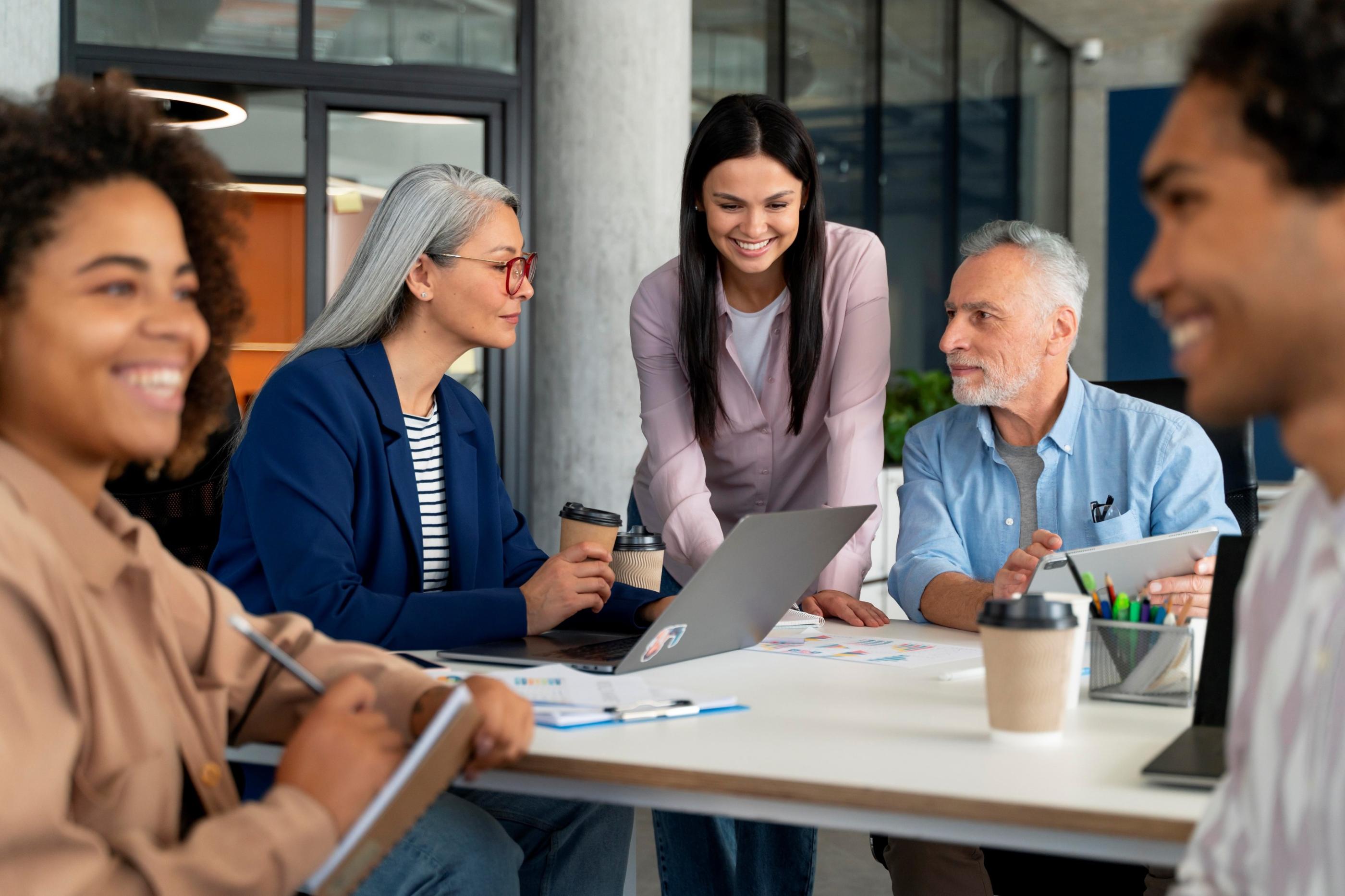People of different generations working together at a table