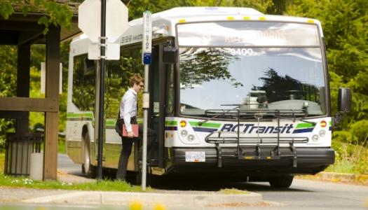 student-at-busstop-boarding-BC-Transit-bus