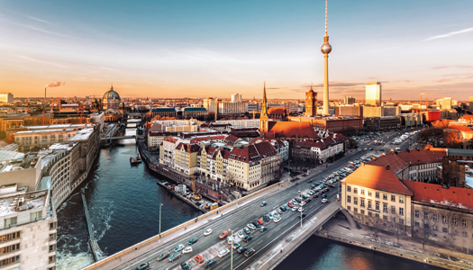 Arial view of a cityscape during sunset