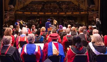 Convocation from the back of the stage at the Royal Theatre in downtown Victoria looking out toward the audience.