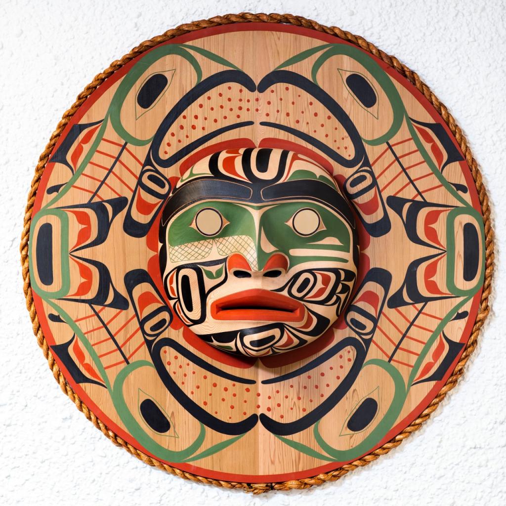 Indigenous-carving-mask-hung-on-wall