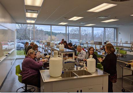 Name SES-students-in-Sherman-Jen-labs-sorting-and-packaging-seeds