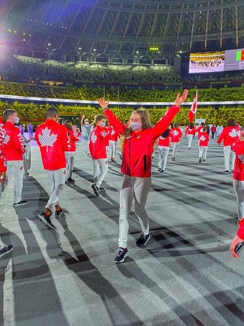 Haley Daniels celebrates at the opening ceremony of the Tokyo Olympics.