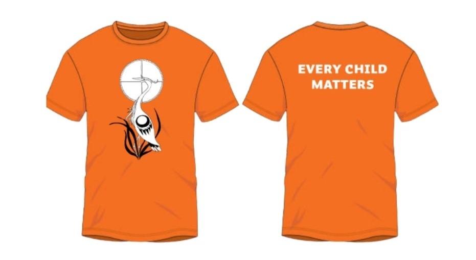 An orange shirt with a heron and medicine wheel on the front and "Every Child Matters" on the back. Artwork by Songhees Elder, Butch Dick, a member of the RRU Heron Peoples Circle..