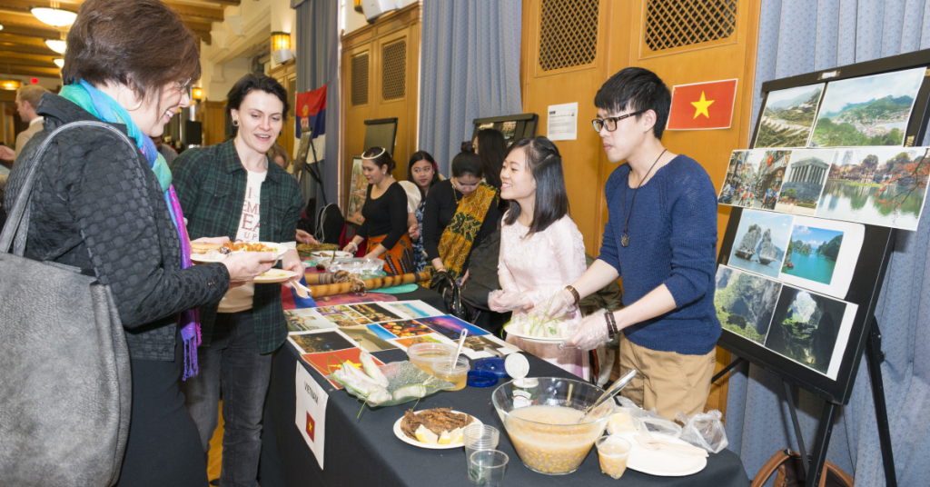 Students present pictures, information and traditional food dishes of Vietnam at the Royal Roads International Showcase.