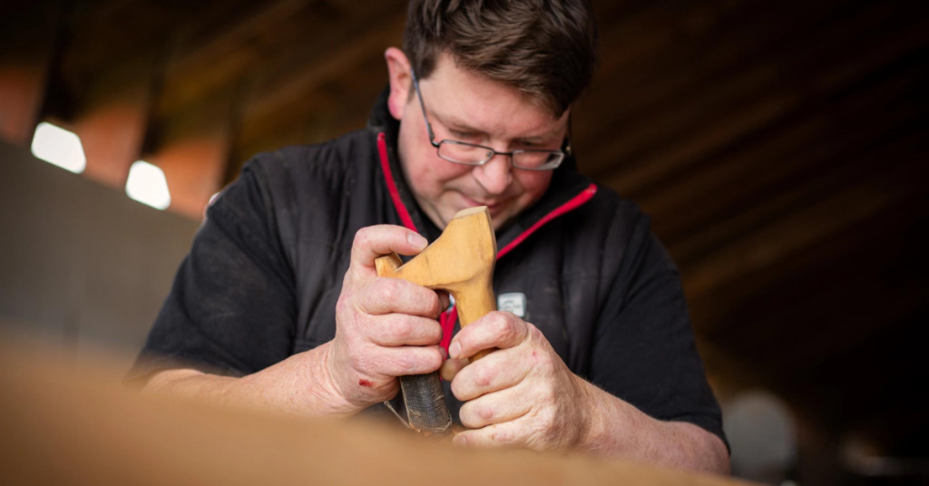 Beau Wagner is seen carving.