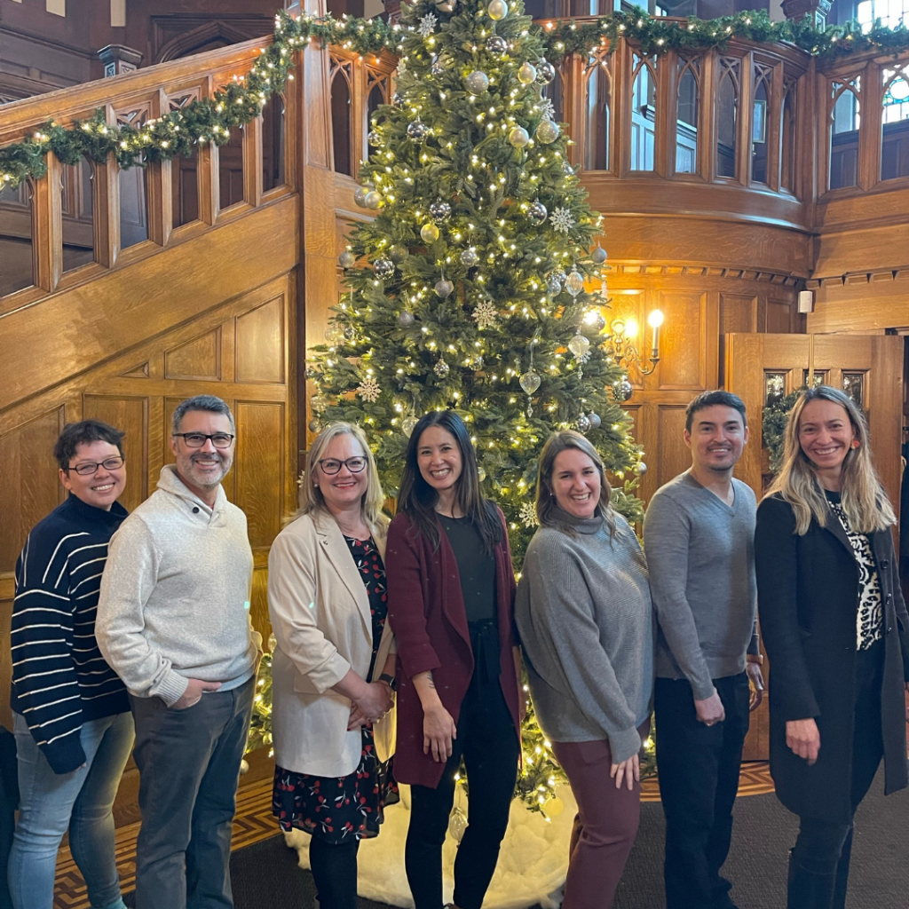 The GRP team in front of the lit tree at Hatley Castle